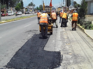 Realiza Infraestructura bacheo en la federal México-Puebla
